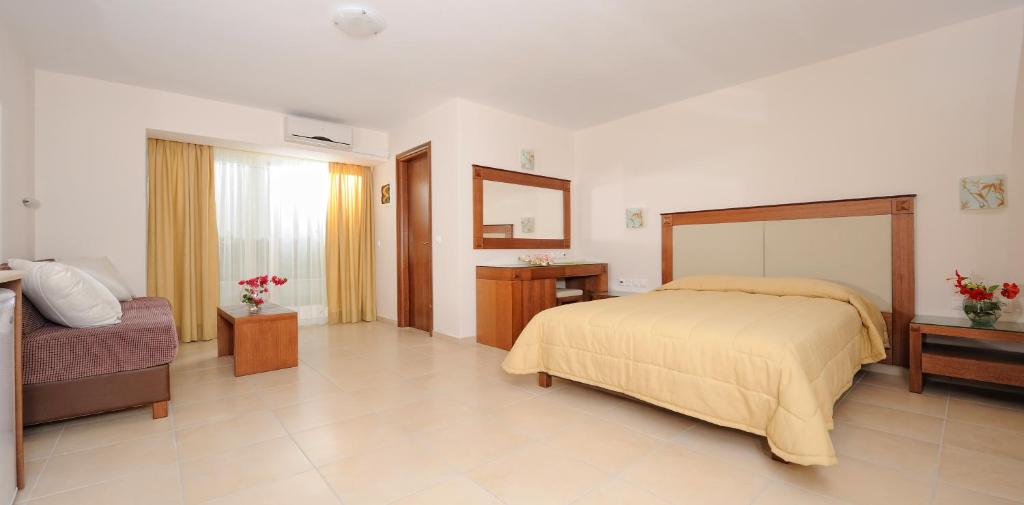 Postel nebo postele na pokoji v ubytování Cretan Garden Adults only Hotel 16plus
