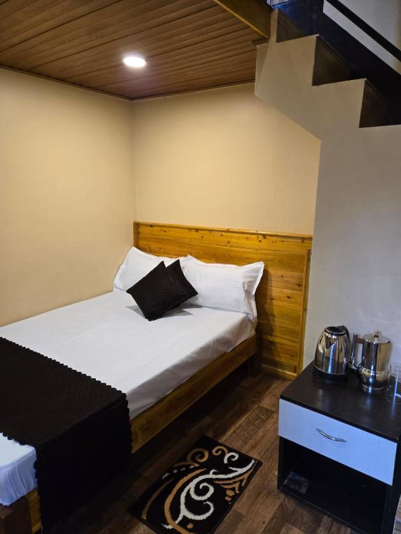 Postel nebo postele na pokoji v ubytování Aishiki's Nest