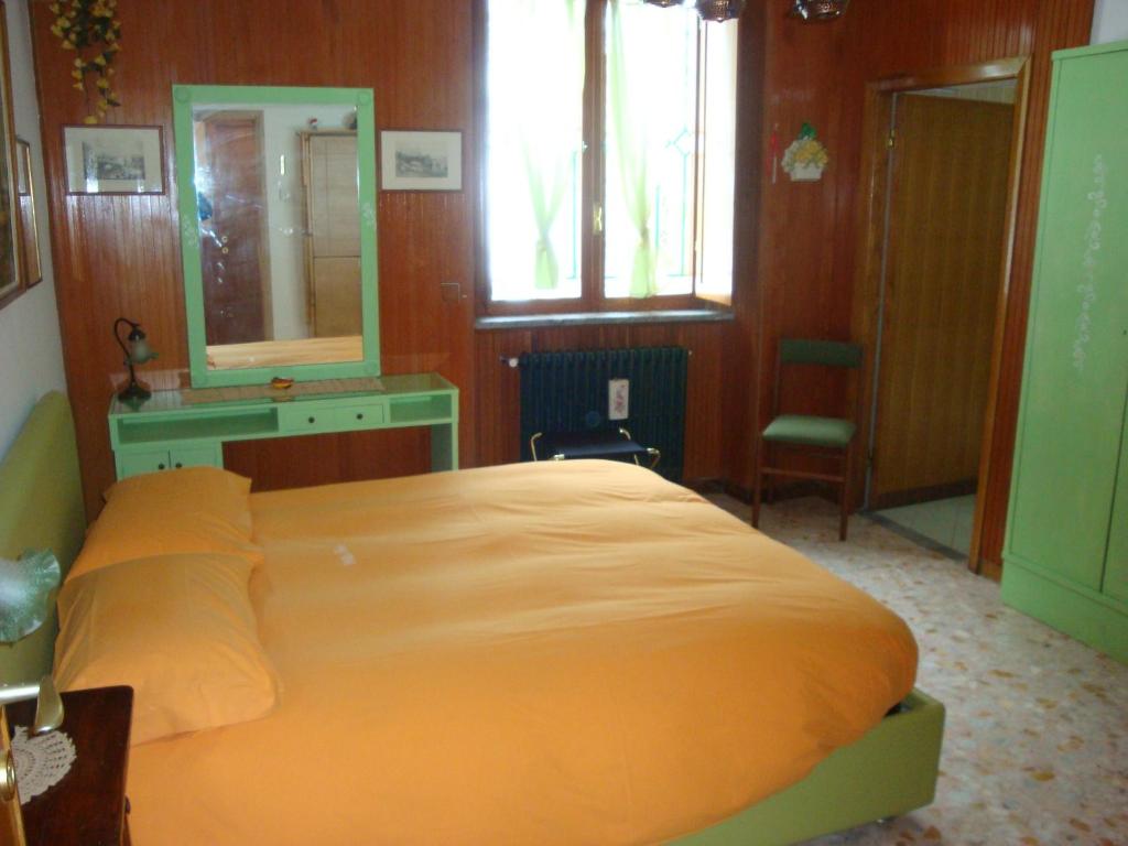 Postel nebo postele na pokoji v ubytování B&B Villa Tina