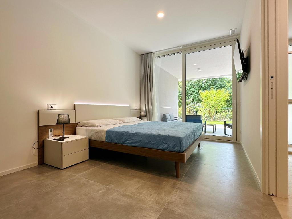 Giường trong phòng chung tại Venezia-Mestre Elite apartment BrosA