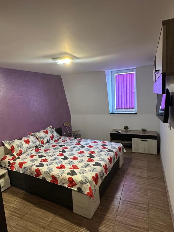 Ένα ή περισσότερα κρεβάτια σε δωμάτιο στο Guest Rooms Comfort 2