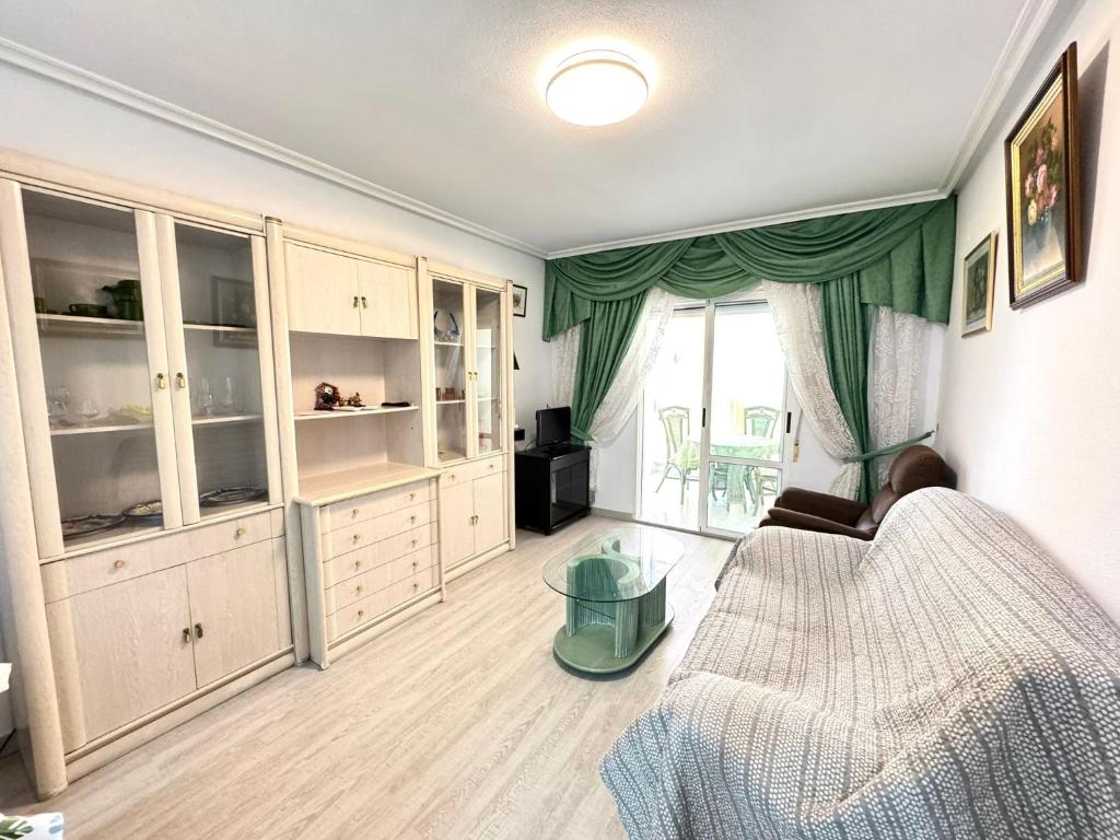 Ένα ή περισσότερα κρεβάτια σε δωμάτιο στο Beach Apartament