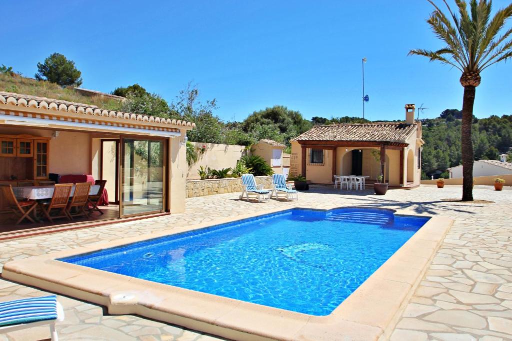 Bazén v ubytování Santa Ana - pretty holiday property with garden and private pool in Benissa nebo v jeho okolí