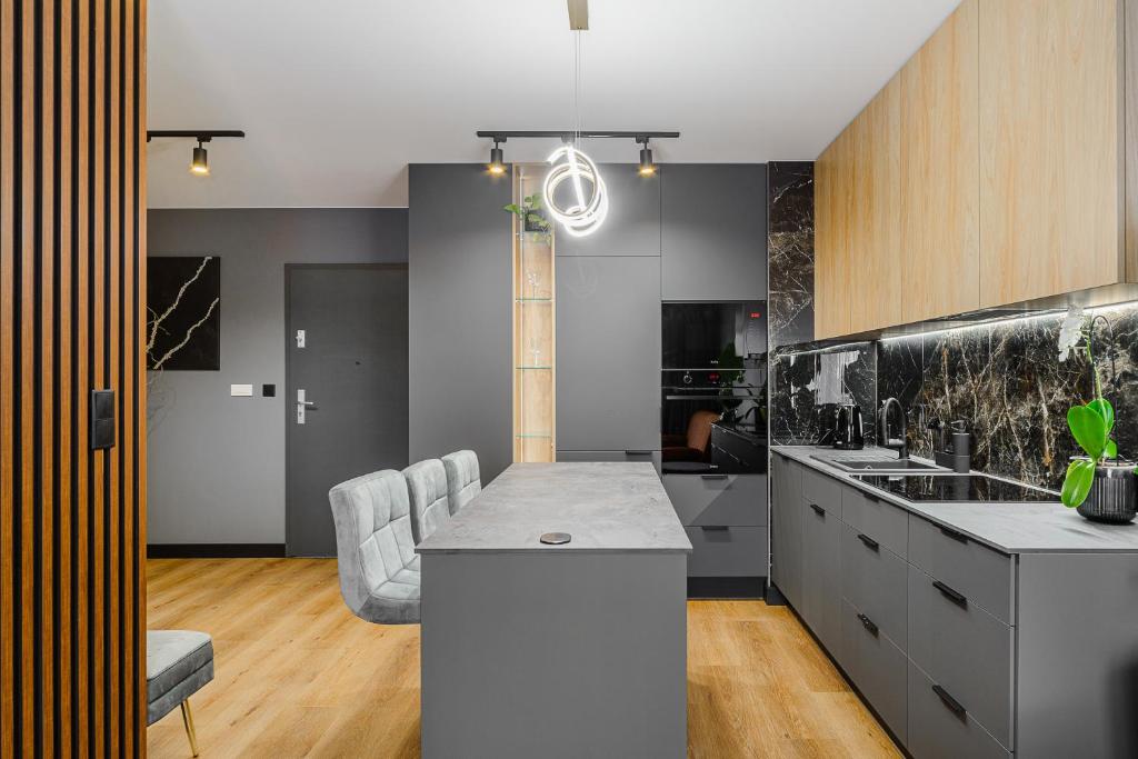 Køkken eller tekøkken på Lumina luxury apartment with parking