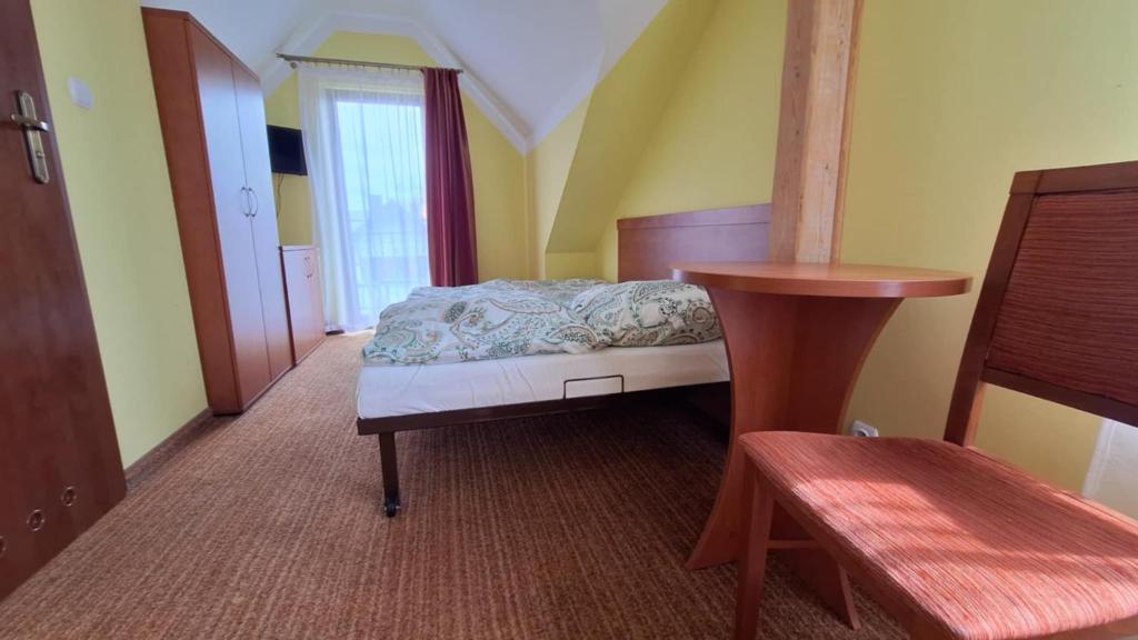 Postel nebo postele na pokoji v ubytování Rafa