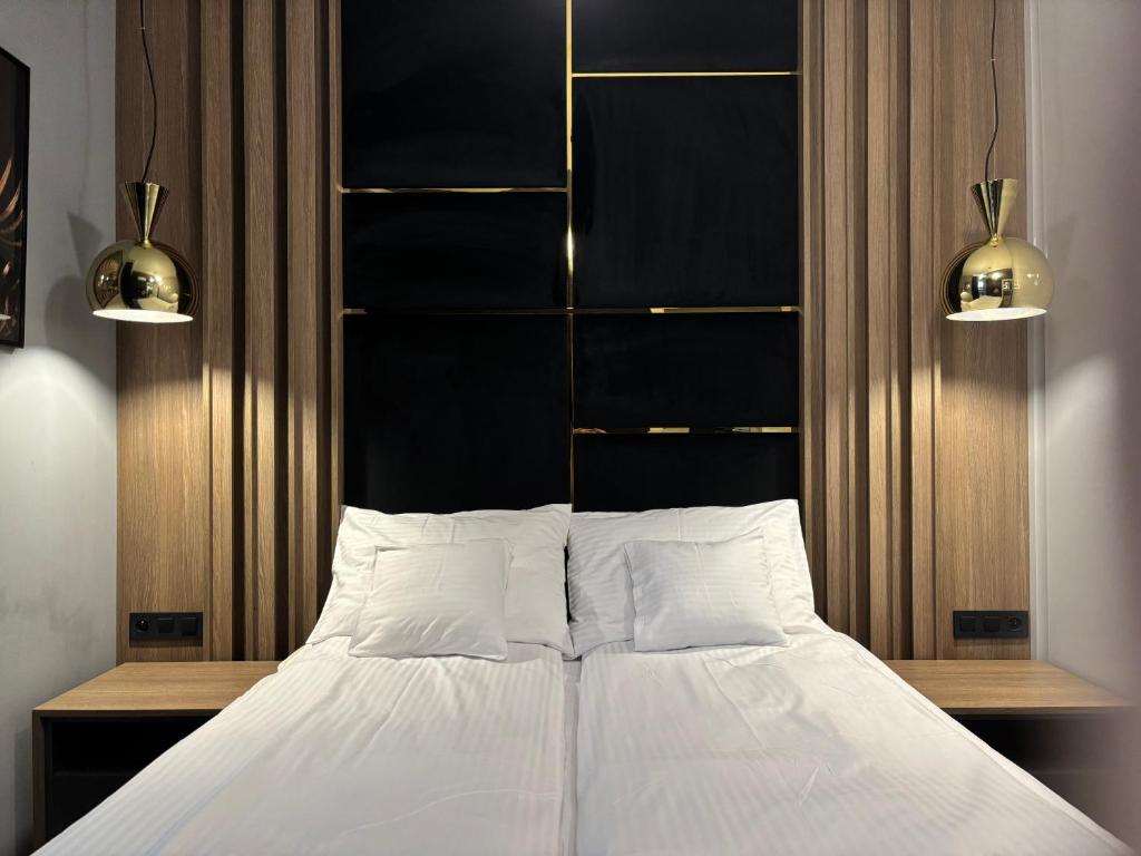 Ένα ή περισσότερα κρεβάτια σε δωμάτιο στο Apartament Manu View - Parking Podziemny- WiFi - Klimatyzacja - FV