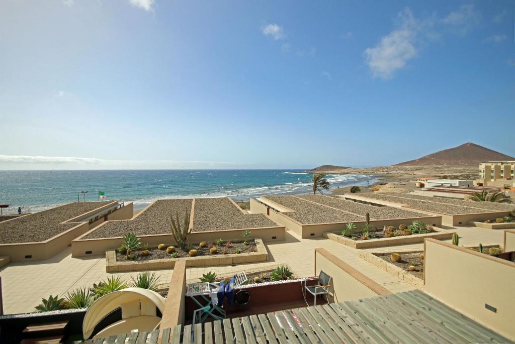 Casa Medano 33 by Rentmedano, 2 bedroomed beach front property with parking