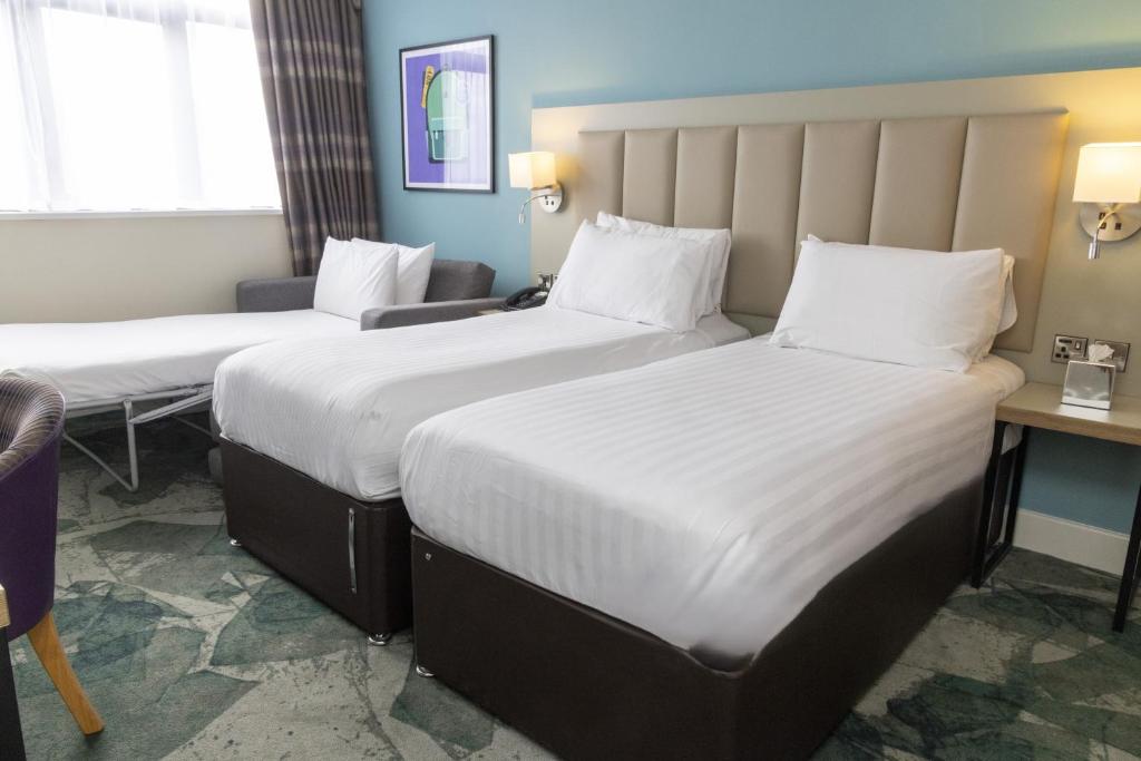 
Standard Twin Room with Two Single Beds and One Sofa Bed
