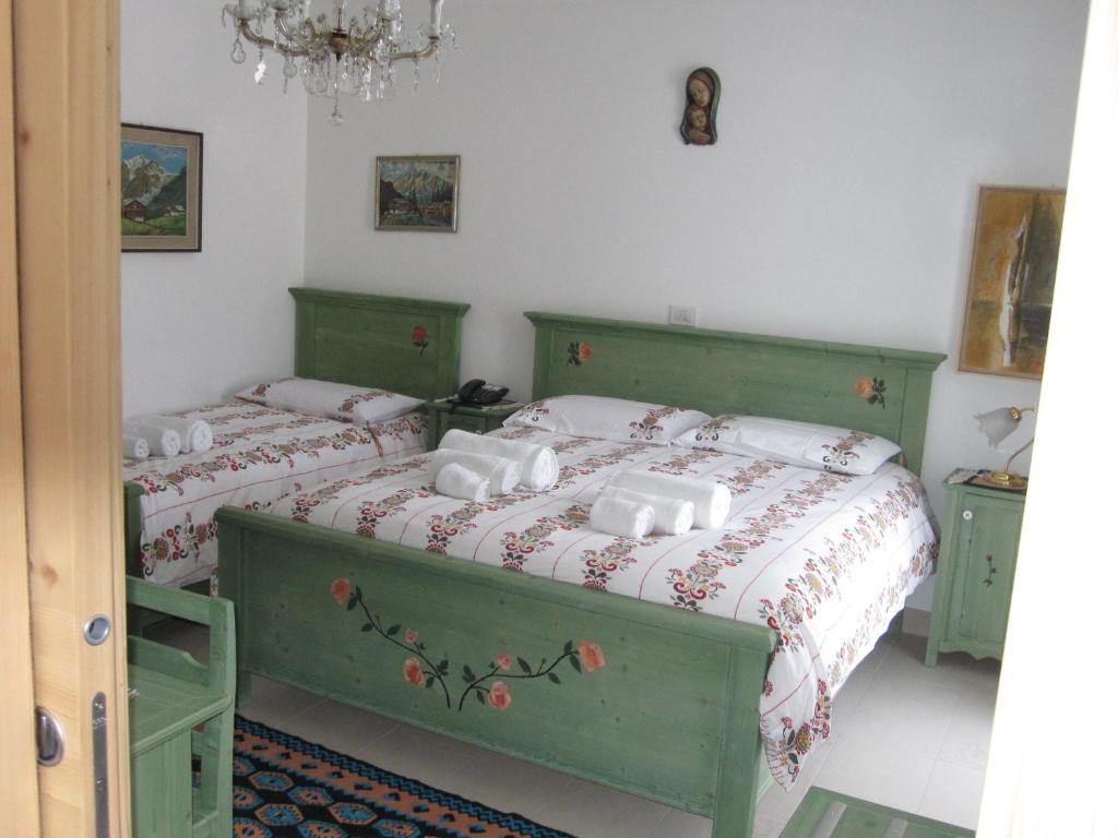 Posteľ alebo postele v izbe v ubytovaní R&B La Gerla Blu