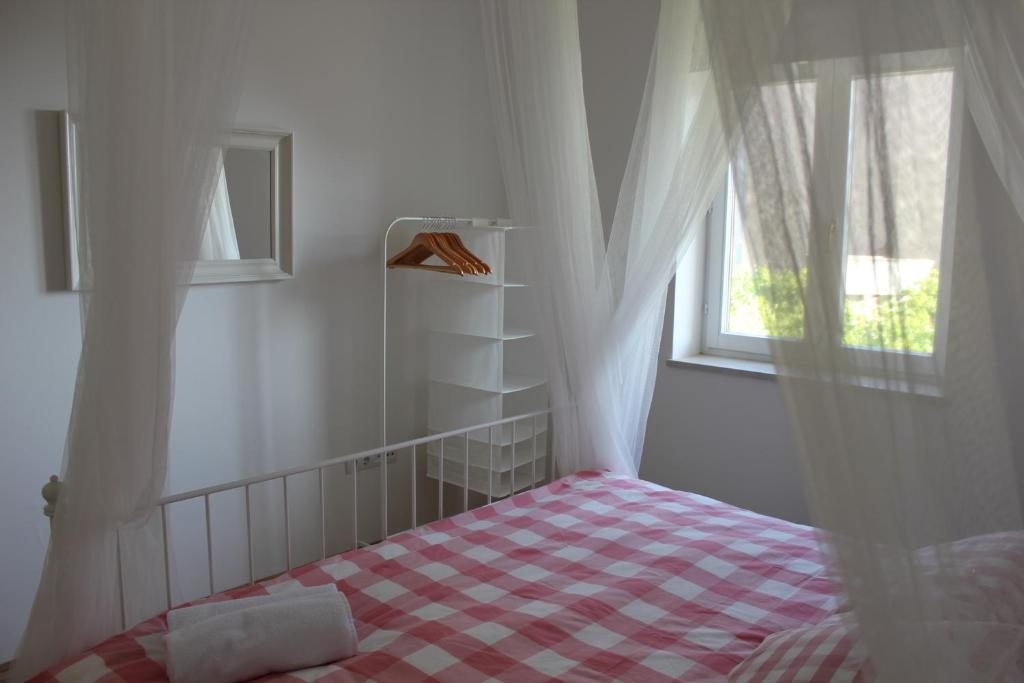 Posteľ alebo postele v izbe v ubytovaní Smile & Enjoy Apartments