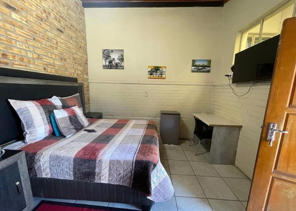 TV a/nebo společenská místnost v ubytování Taoana Guest House