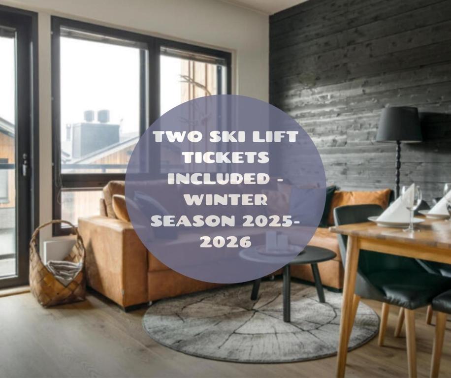two ski lift tickets updated winter season sign in a living room at Ski Chalet C9 Ski-in Ski-out by Aavalevi in Levi