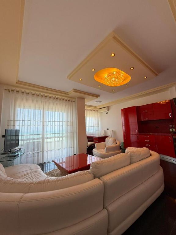 Postel nebo postele na pokoji v ubytování La Perla Rossa