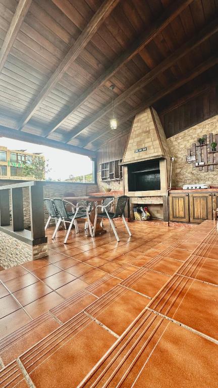 a kitchen with a table and chairs in a room at Relaxing Villa Las Torres in Adeje