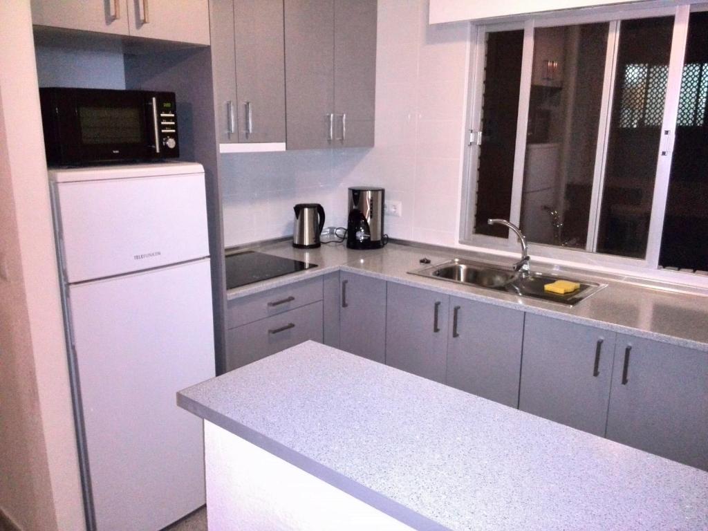 Kuchyň nebo kuchyňský kout v ubytování Apartment Travesia de Santomera