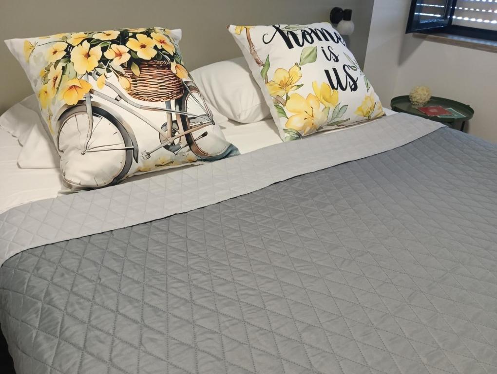 Postel nebo postele na pokoji v ubytování Aveiro Ria View