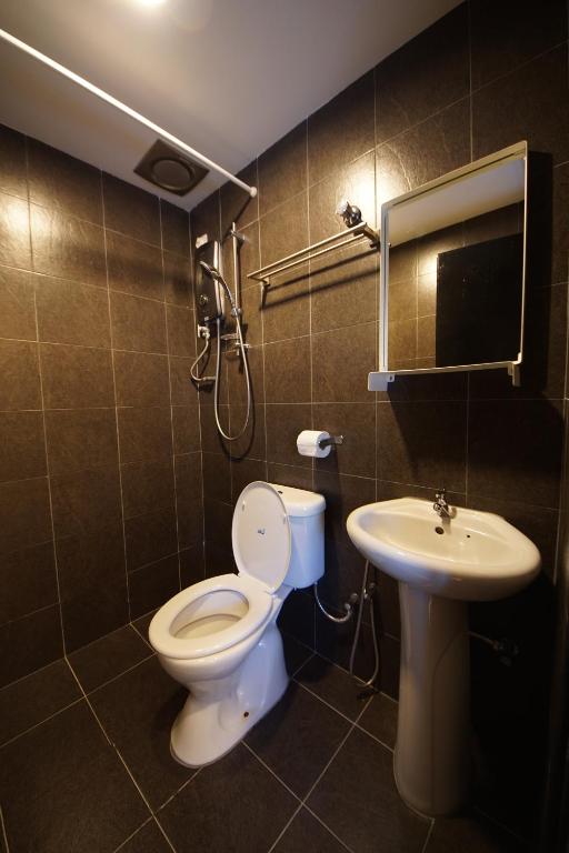 Koupelna v ubytování Tulip Hotel