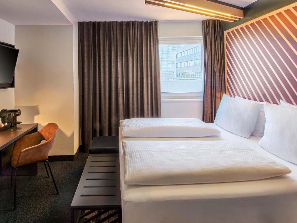 B&B HOTEL Frankfurt-Niederrad - Resim 12