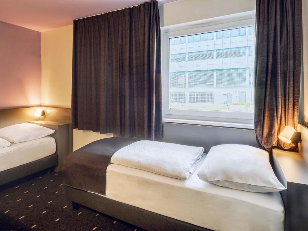 B&B HOTEL Frankfurt-Niederrad - Resim 9