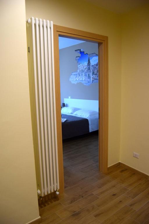 Postel nebo postele na pokoji v ubytování Civico 28