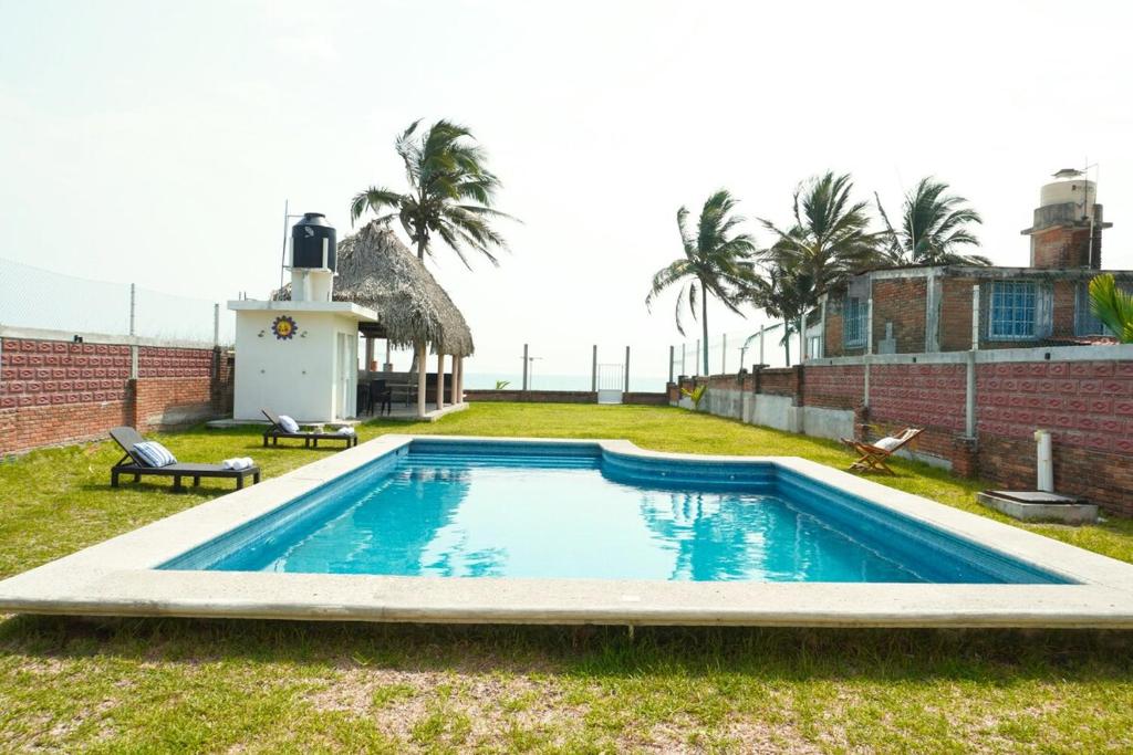 Bazén v ubytování Bamboo La Perla del Puerto Pool & Beach nebo v jeho okolí