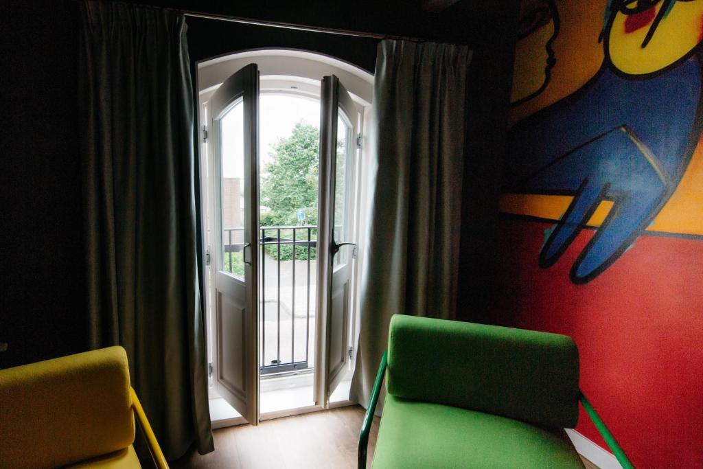 Posezení v ubytování Hotel De Gravin