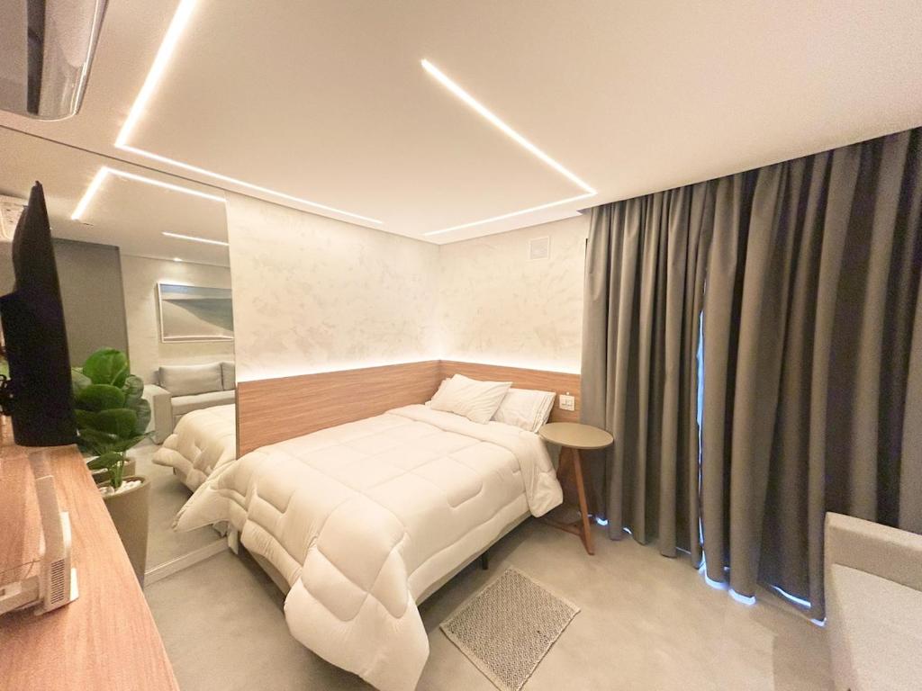 Ένα ή περισσότερα κρεβάτια σε δωμάτιο στο Brooklin Design e Luxo - Próx Metro & Sh Morumbi
