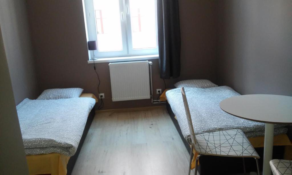 Postel nebo postele na pokoji v ubytování Hostel Imbir