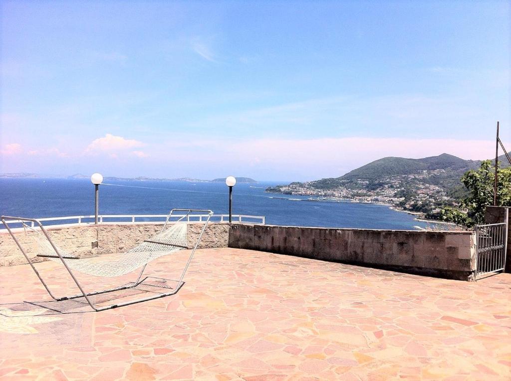 a view of the ocean from a terrace of a house at Appartamenti Miramare in Collina Sea-view Hillside in Ischia