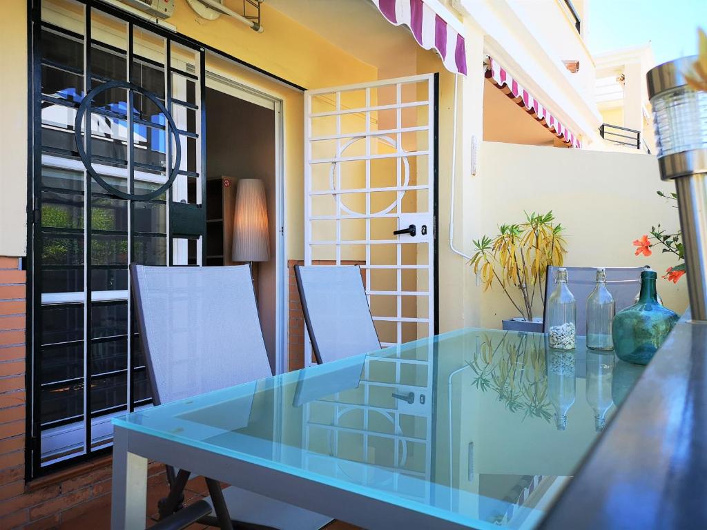 En terrasse eller udendørsområde på BAVIERA GOLF APARTAMENTO TERRAZA Y JARDIN