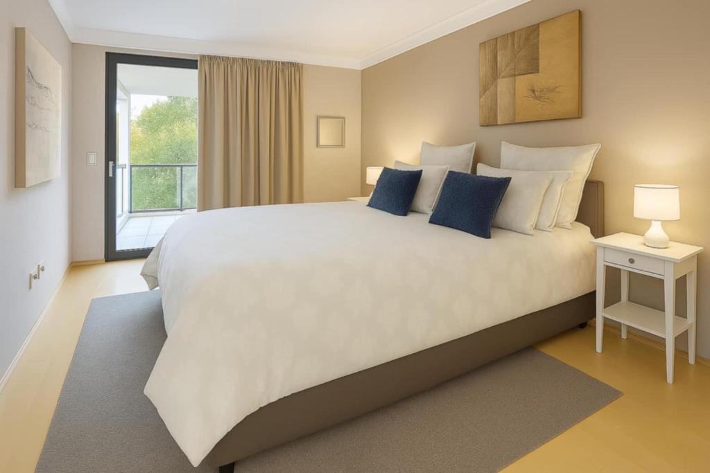 Postel nebo postele na pokoji v ubytování Melville Oasis