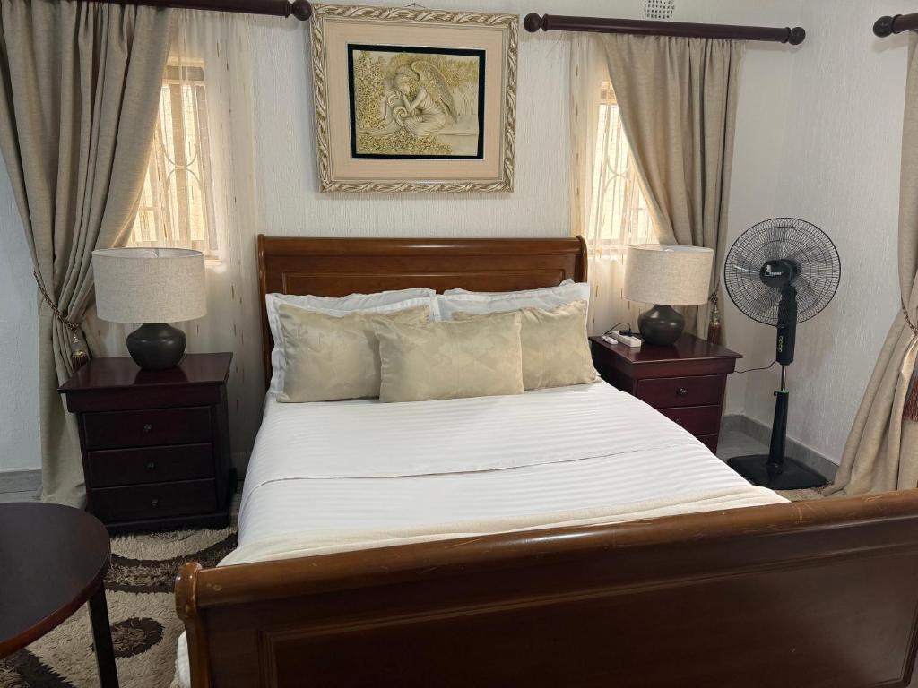 Giường trong phòng chung tại The Java Tree Suite