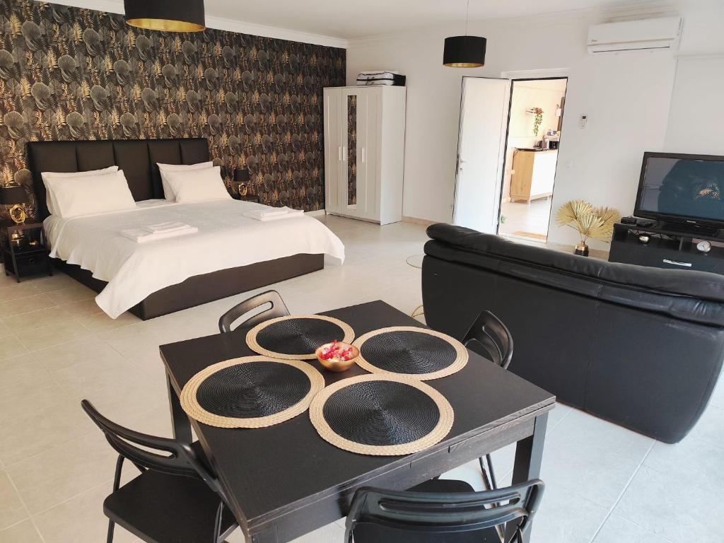 Ένα ή περισσότερα κρεβάτια σε δωμάτιο στο Verdizela Suites