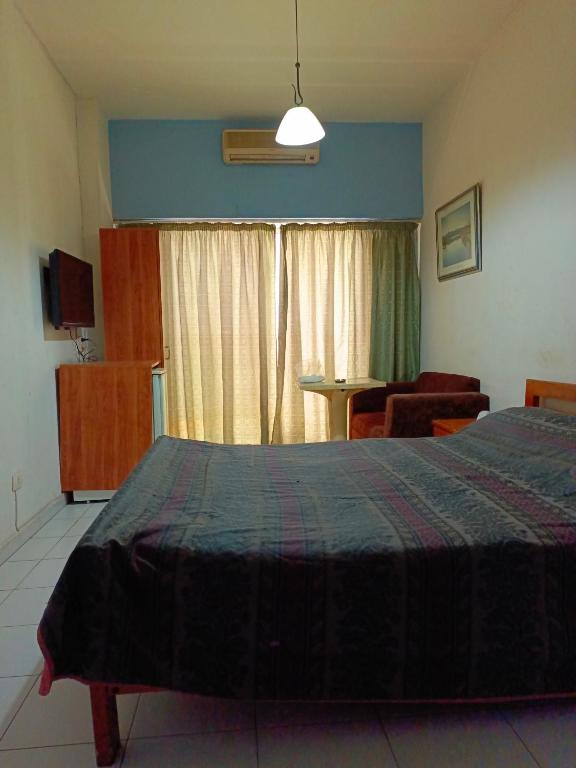 Postel nebo postele na pokoji v ubytování Edward v hotel
