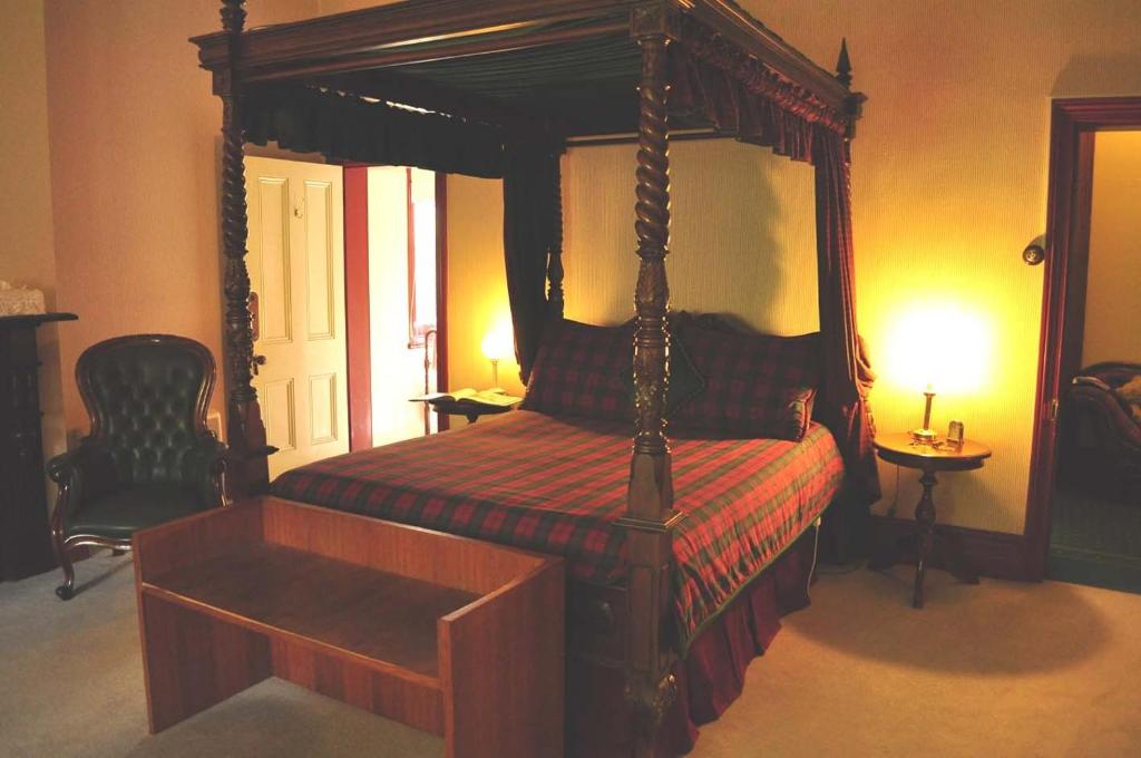 Postel nebo postele na pokoji v ubytování Ormiston House