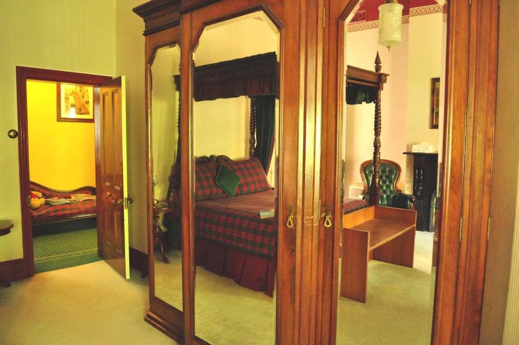 Postel nebo postele na pokoji v ubytování Ormiston House