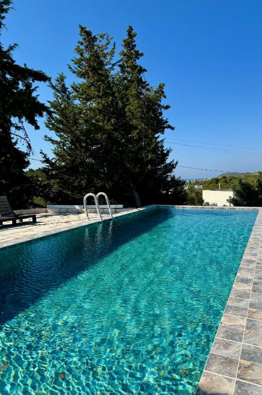 Bazén v ubytování Villa & Apartament Armonia 1 Sol Ignis Gavalochori-Vamos KRETA nebo v jeho okolí