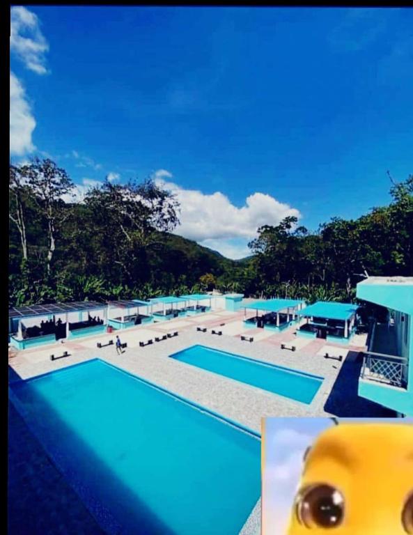 a view of a swimming pool with a toy next to it at Paraíso Vacacional FERNANDO in Polo