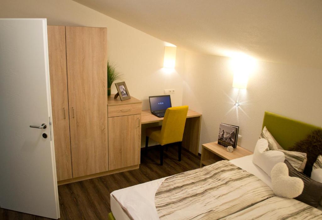 Postel nebo postele na pokoji v ubytování Appartement Tirol