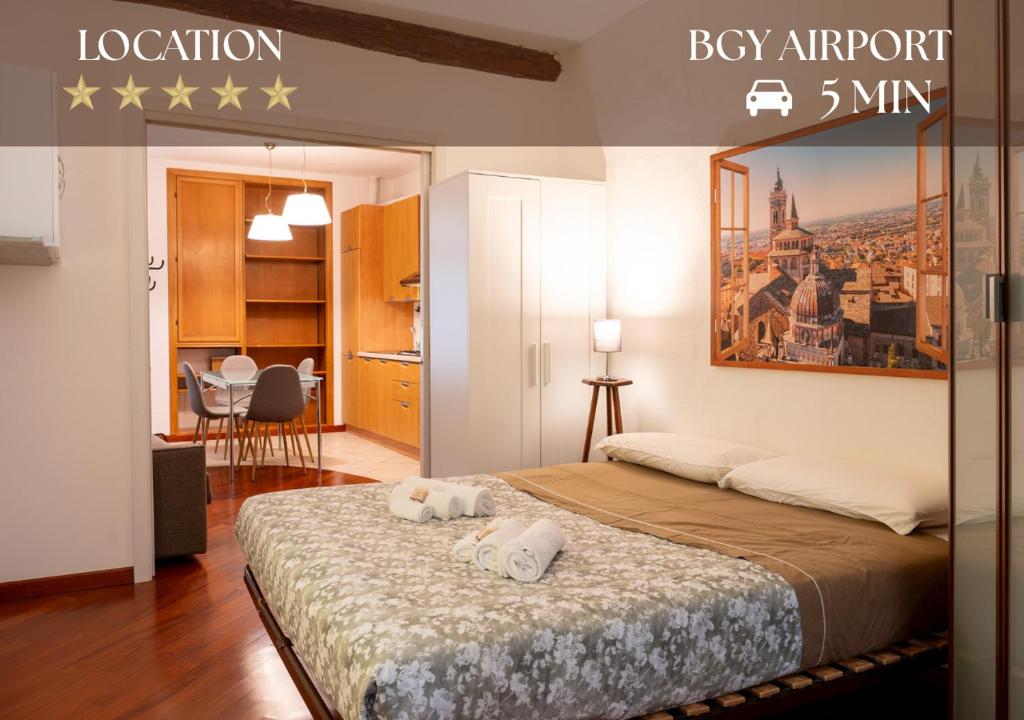 Ένα ή περισσότερα κρεβάτια σε δωμάτιο στο Bergamo Alta - Charm & History