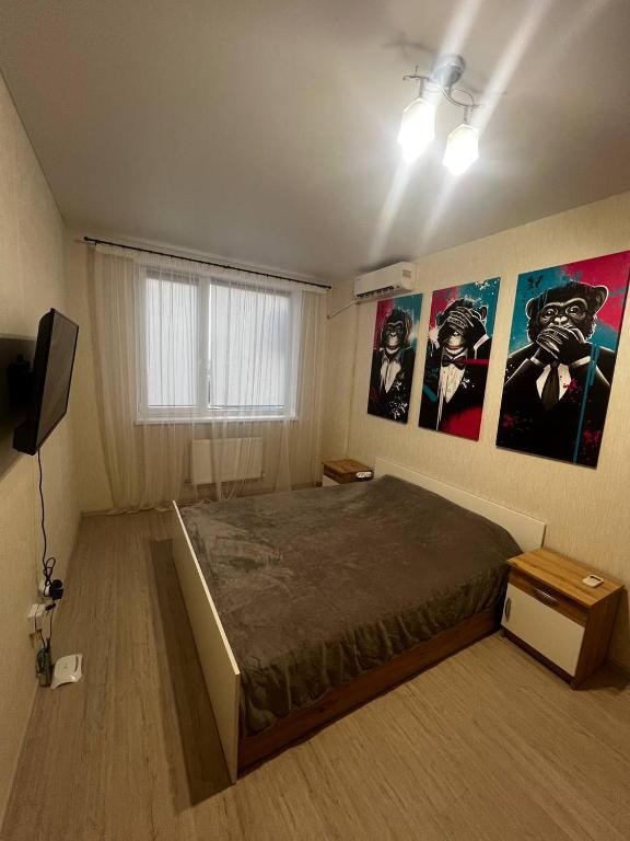 Ένα ή περισσότερα κρεβάτια σε δωμάτιο στο 7SKY Apartment