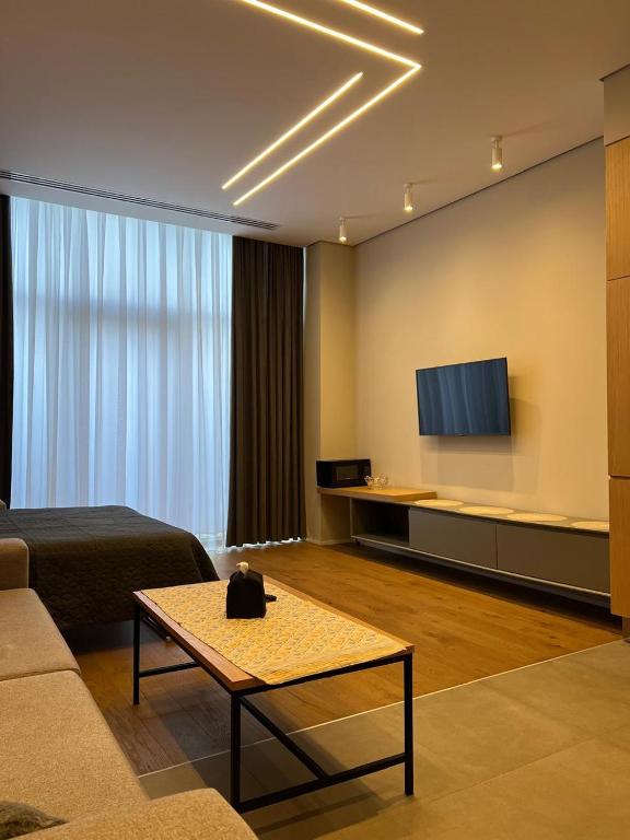TV i/ili multimedijalni sistem u objektu Lightouse 2