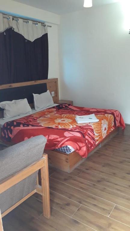Postel nebo postele na pokoji v ubytování umar ul yy stay