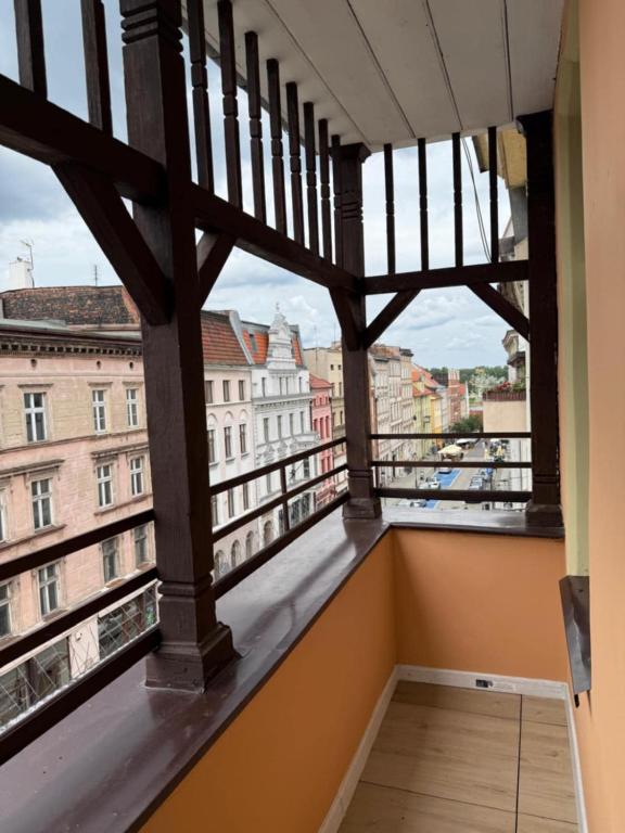 a balcony with a view of the city at Belvedere Old Town with Balcony AC Progres in Toruń