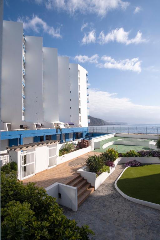 a rendering of a resort with the ocean in the background at Costa Libertad, Mesa del mar in Tacoronte