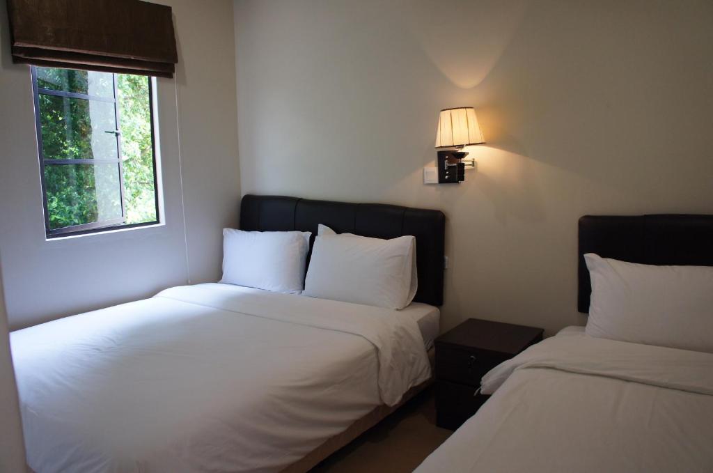 Postel nebo postele na pokoji v ubytování Hotel Hong