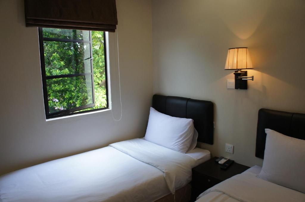 Postel nebo postele na pokoji v ubytování Hotel Hong