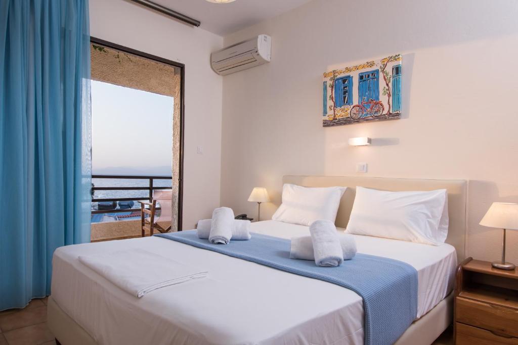 Postel nebo postele na pokoji v ubytování Lido Hotel