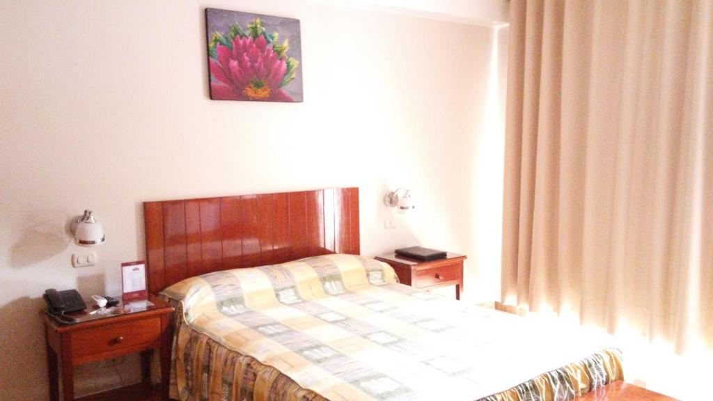 Postel nebo postele na pokoji v ubytování Amazonia Siu Hostal