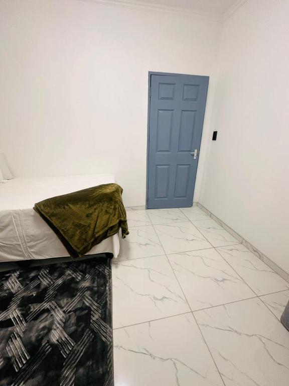 Ένα ή περισσότερα κρεβάτια σε δωμάτιο στο Urban Nest Khomasdal